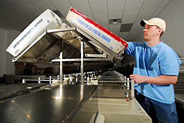 Maine Commercial & Industrial Photography - Mail Sorting Machine and Postal Employee